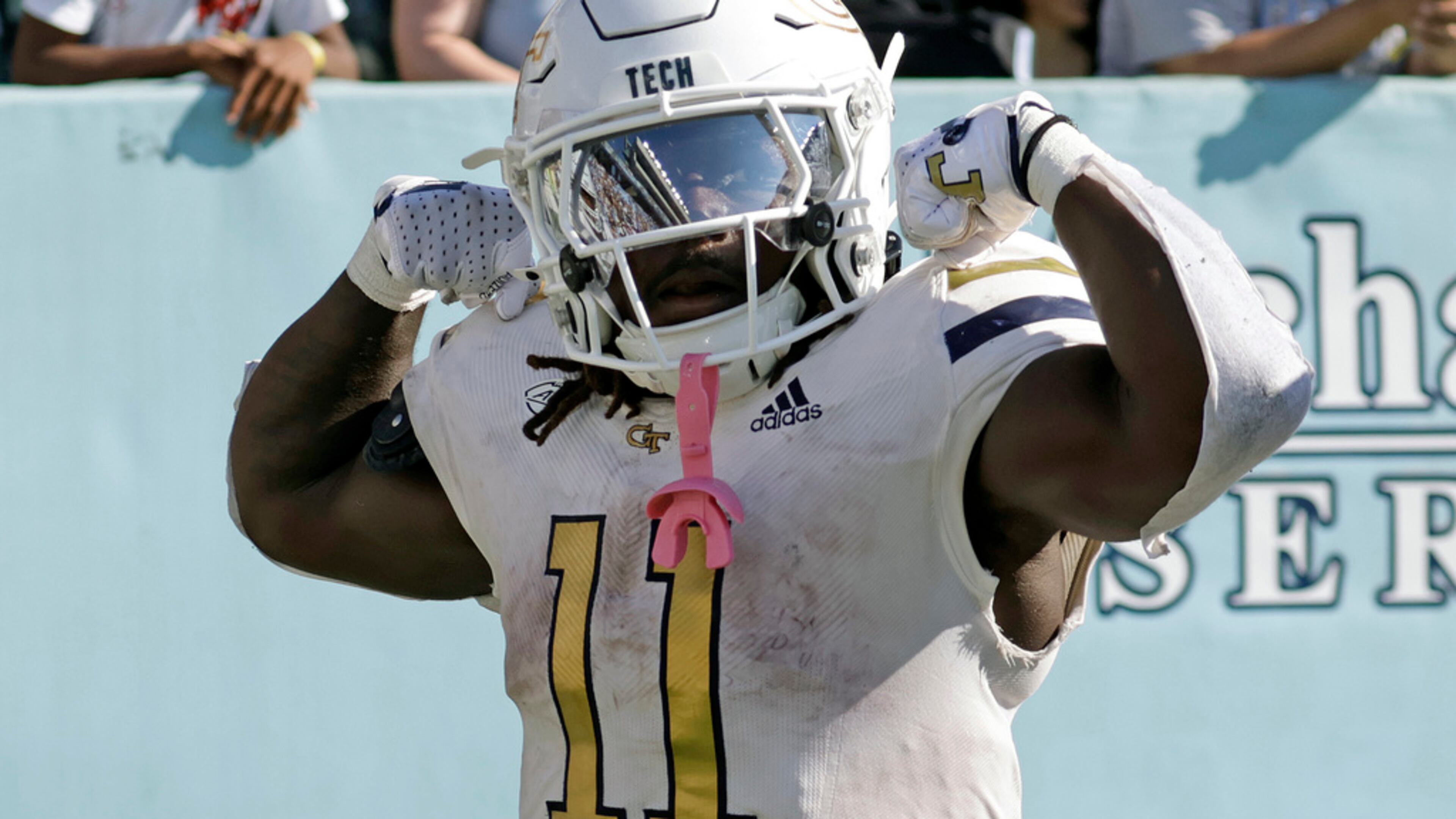 Georgia Tech running back Jamal Haynes (11) celebrates after he scored the winning touchdown on a long run in the closing seconds of an NCAA college football game against North Carolina, Saturday, Oct. 12, 2024, in Chapel Hill, N.C. (Chris Seward/AP)