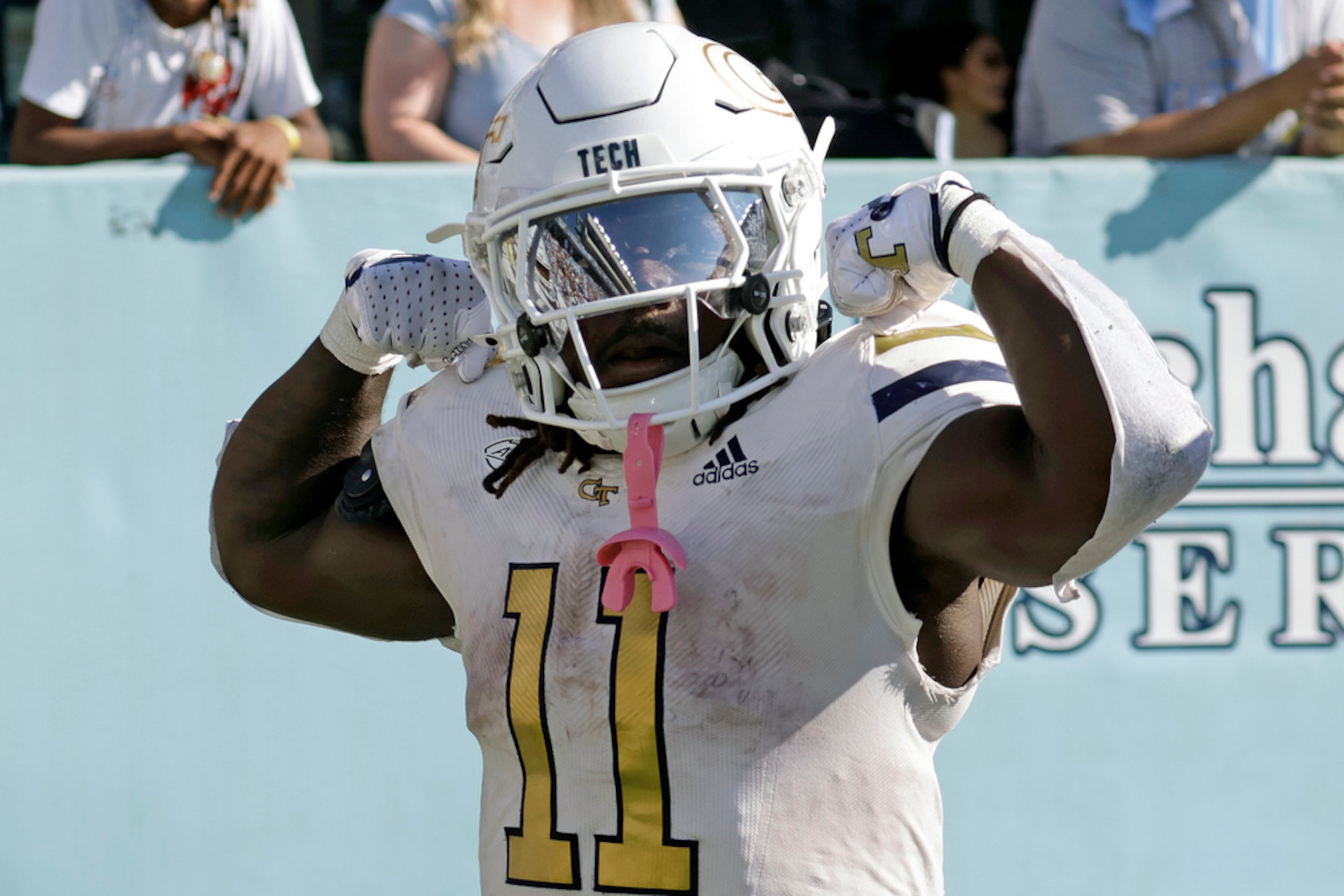 Georgia Tech running back Jamal Haynes (11) celebrates after he scored the winning touchdown on a long run in the closing seconds of an NCAA college football game against North Carolina, Saturday, Oct. 12, 2024, in Chapel Hill, N.C. (Chris Seward/AP)