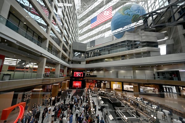 Guests mingle ahead of an unveiling event at The CTR, the former CNN Center, on Wednesday, May 20, 2026, in Atlanta. The former CNN Center in downtown Atlanta has been rebranded and unveiled as The CTR. CP Group, the property's owners, are transforming the iconic 1.2-million-square-foot complex into a massive mixed-use hub featuring a revamped food hall, experiential entertainment, and public art. (Hyosub Shin/AJC)