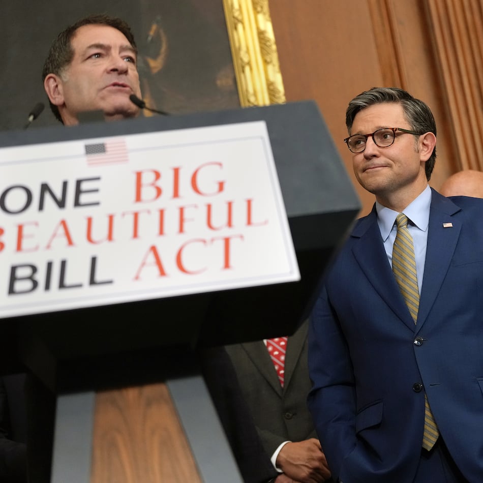 U.S. Speaker of the House Mike Johnson (R-LA) listens as House Homeland Security Chairman Mark Green (R-TN) speaks to the media after the House narrowly passed a bill forwarding President Donald Trump's agenda, May 22, 2025 in Washington, D.C. (Kevin Dietsch/Getty Images/TNS)
