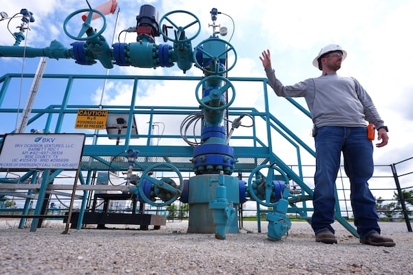 BKV Carbon Ventures project manager Spencer Crouch explains how the carbon capture and sequestration process works at their facility in Bridgeport, Texas, Thursday, May 29, 2025. (AP Photo/LM Otero)
