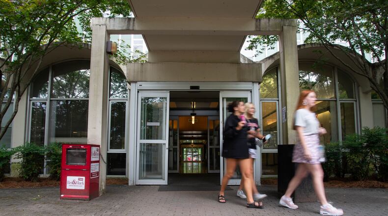 New residents of Creswell Hall leave the building on Monday, Aug. 16, 2021 on the University of Georgia's Campus in Athens, a few days before the start of the fall semester. University officials said on Monday, Dec. 6, they will complete an intensive cleaning and maintenance initiative in several residence halls, including the Hill and Creswell communities in response to complaints about dorm conditions. (Julian Alexander for the Atlanta Journal-Constitution)