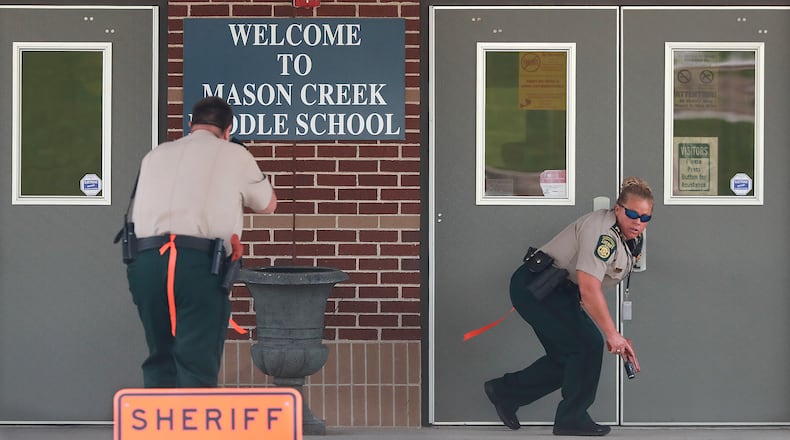 July 25, 2018 Winston: Douglas County Sheriff's deputies are some of the first to arrive during an active shooter training exercise held by the Douglas County Sherriff's Office at Mason Creek Middle School on Wednesday, July 25, 2018, in Winston. The large-scale training drill is meant to test the resources of area law enforcement and emergency responders in an effort to better prepare Douglas County First Responders in the event of a mass casualty active shooter event. Curtis Compton/ccompton@ajc.com
