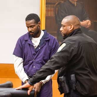 Ciarre Campbell (left) appears in a Fulton County courtroom on Tuesday, July 21, 2026, in Atlanta. Ciarre Campbell, brother of NFL player Calais Campbell, is charged with murder in the June death of his mother, Nateal Campbell. (Arvin Temkar/AJC)