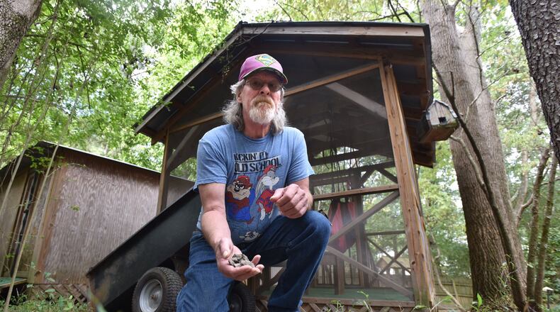 The backyard of Euharlee resident Mitch Meade was covered in toxic coal ash sludge during a 2008 spill at Plant Bowen. Georgia Power told the Covered Bridge Springs homeowner that it had cleaned up the waste, although tests show high levels of arsenic, a carcinogen commonly found in coal ash. HYOSUB SHIN / HSHIN@AJC.COM