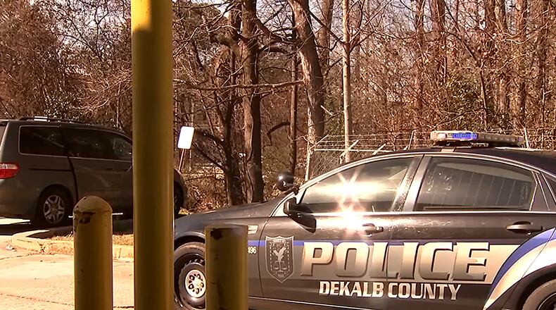 DeKalb County police are investigating after an Uber driver and a 17-year-old passenger were shot early Sunday.