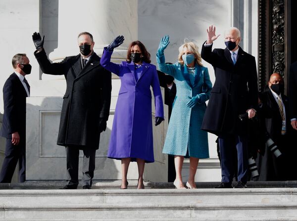 President Joe Biden, right, with first lady Jill Biden, second from right, Vice President Kamala Harris, second from left, and her husband Douglas Emhoff, arrive on the East Front of the U.S. Capitol on Wednesday. (Carolyn Cole/Los Angeles Times/TNS)