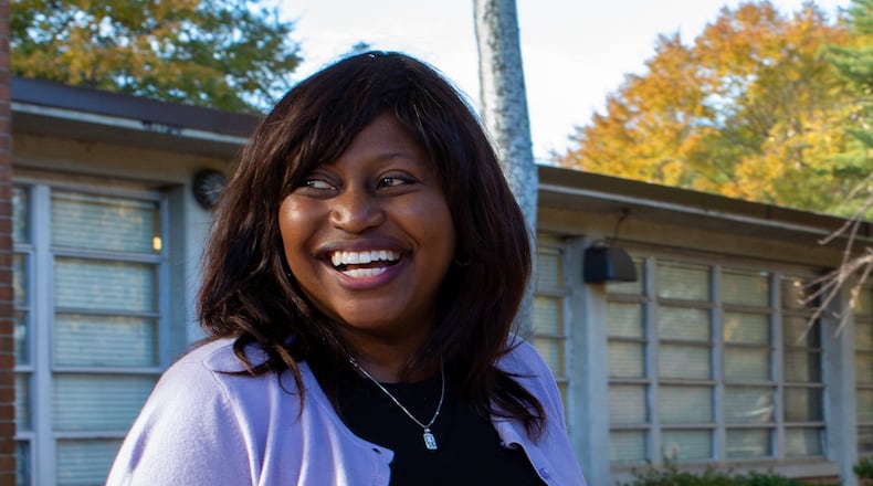 Principal Stephanie Brown-Bryant smiles outside of Indian Creek Elementary School in Clarkston, Georgia, on Thursday, Nov. 21, 2019. (Photo/Rebecca Wright for the Atlanta Journal-Constitution)