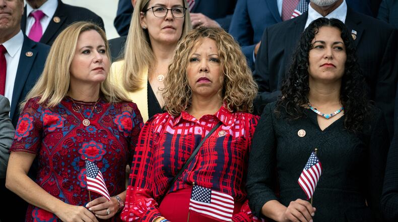 From left, Rep. Debbie Mucarsel-Powell (D-Fla.), Rep. Lucy McBath (D-Ga.) and Rep. Xochitl Torres Small (D-N.M.) join other members of the House of Representatives in observing a moment of silence at the Capitol on Wednesday, Sept. 11, 2019, to mark the 18th anniversary of the Sept. 11 terror attacks. (Erin Schaff/The New York Times)