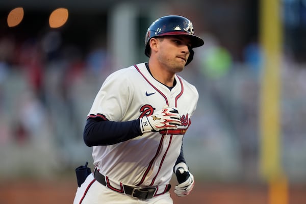 Atlanta Braves' Austin Riley (27) rounds the bases after hitting a two-run homer against the Los Angeles Dodgers in the third inning of a baseball game, Sunday, May 4, 2025, in Atlanta. (AP Photo/Mike Stewart)