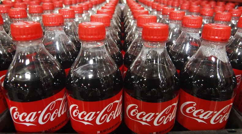 The amount of Coke-branded soft drinks sold in the U.S. remained flat last year, but rival Pepsi-branded soft drinks lost ground in the perpetual battle for consumers, according to the latest figures from trade publication Beverage Digest. REUTERS/George Frey/Files