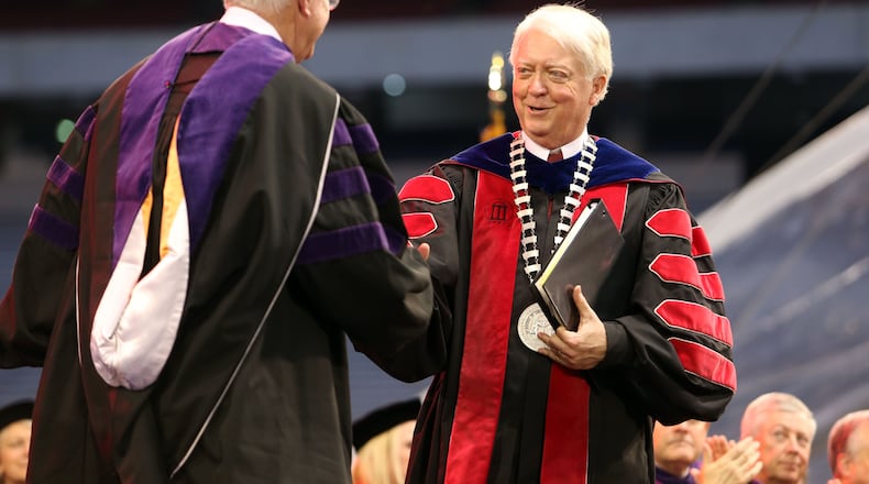 Former University of Georgia president Michael Adams, right, shown in this AJC file photo, has been named chancellor of Pepperdine University. Adams led UGA from 1997 to 2013. He begins his new position at the California institution August 1. JASON GETZ / JGETZ@AJC.COM