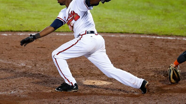 ATLANTA, GA - AUGUST 06: Eury Perez #14 of the Atlanta Braves hits an RBI single in the eighth inning to knock in the winning run during the game against the Miami Marlins at Turner Field on August 6, 2015 in Atlanta, Georgia. (Photo by Mike Zarrilli/Getty Images)