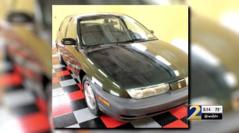 One man is in custody in connection with the car theft, and police are still trying to find a second man.