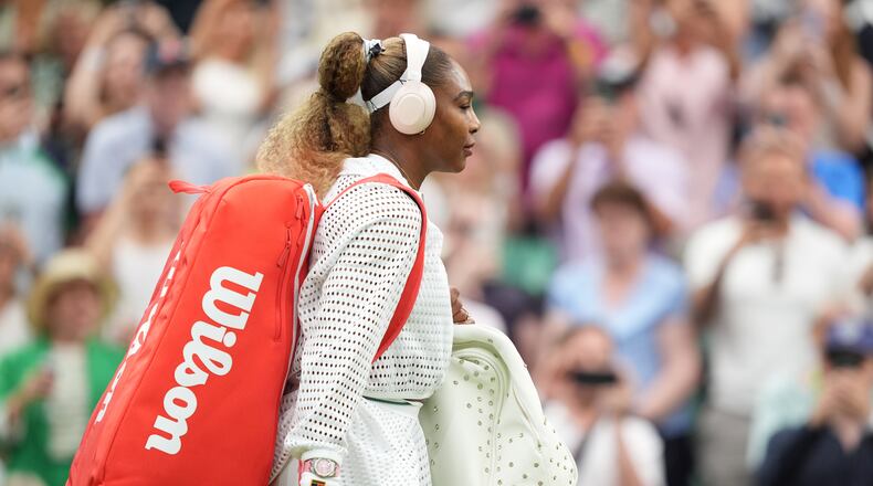Serena Williams of the United States enters the centre court to play against Maya Joint of Australia in their first round women's singles match at the Wimbledon Tennis Championships in London, Tuesday, June 30, 2026. (AP Photo/Maja Smiejkowska)