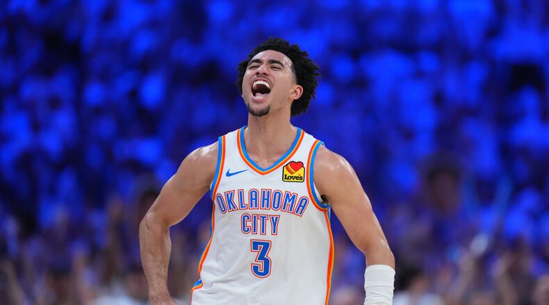 Oklahoma City Thunder guard Jared McCain (3) reacts to a basket against the San Antonio Spurs in the second half of Game 5 in the Western Conference finals NBA basketball playoffs series, Tuesday, May 26, 2026, in Oklahoma City. (AP Photo/Julio Cortez)