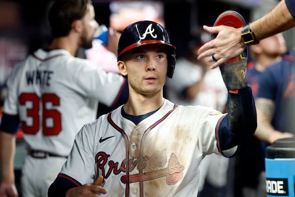 Atlanta Braves' Stuart Fairchild celebrates with teammates after scoring during the ninth inning of a baseball game against the Cincinnati Reds, Tuesday, May 6, 2025, in Atlanta. (AP Photo/Butch Dill)
