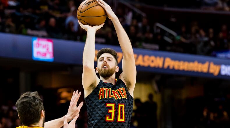 CLEVELAND, OH - APRIL 7: Ryan Kelly #30 of the Atlanta Hawks shoots over Kevin Love #0 of the Cleveland Cavaliers during the second half at Quicken Loans Arena on April 7, 2017 in Cleveland, Ohio. The Hawks defeated the Cavaliers 114-100. NOTE TO USER: User expressly acknowledges and agrees that, by downloading and/or using this photograph, user is consenting to the terms and conditions of the Getty Images License Agreement. (Photo by Jason Miller/Getty Images)