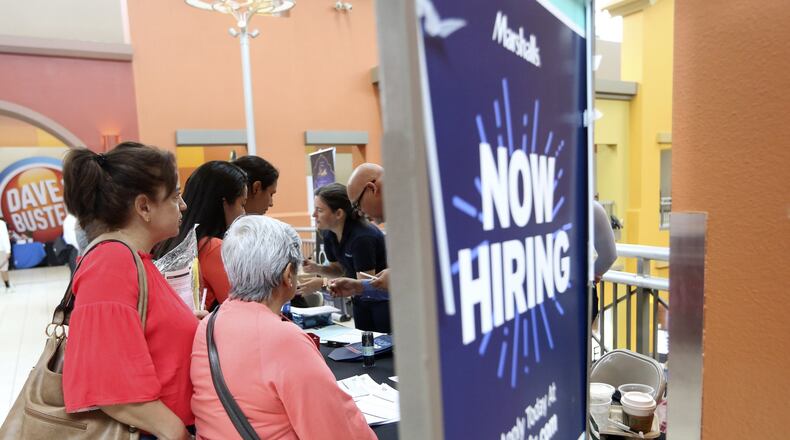 Job growth is going to slow dramatically next year, according to a forecast unveiled Wednesday by the University of Georgia’s Selig Center. (AP Photo/Lynne Sladky, File)