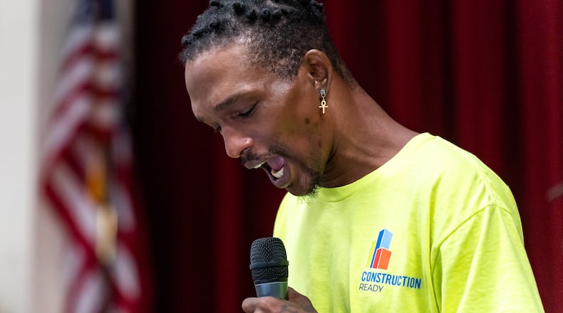Raynard LaNier Jr., a graduate of the Construction Ready training program, speaks during his graduation ceremony at the East Point City Hall Annex in East Point, GA on Friday, August 2, 2024. (Seeger Gray / AJC)