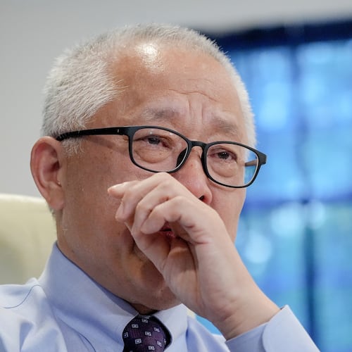 Chinese pastor Ezra Jin Mingri becomes emotional during an interview with The Associated Press in Maryland, Wednesday, July 22, 2026 . (AP Photo/Mariam Zuhaib)