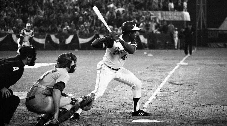 Hank Aaron at bat just before hitting his record-breaking 715th home run at Atlanta-Fulton County Stadium on April 8, 1974. (Billy Downs/AJC 1974)