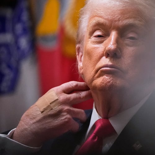 President Donald Trump listens during a Cabinet meeting at the White House, Tuesday, Dec. 2, 2025, in Washington. (AP Photo/Julia Demaree Nikhinson)