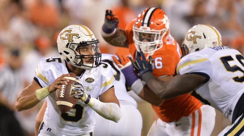 September 22, 2016 Atlanta - Georgia Tech Yellow Jackets quarterback Justin Thomas (5) looks for a space for a pass in the second half at Bobby Dodd Stadium on Thursday, September 22, 2016. Clemson Tigers won 26 - 7 over the Georgia Tech Yellow Jackets. HYOSUB SHIN / HSHIN@AJC.COM