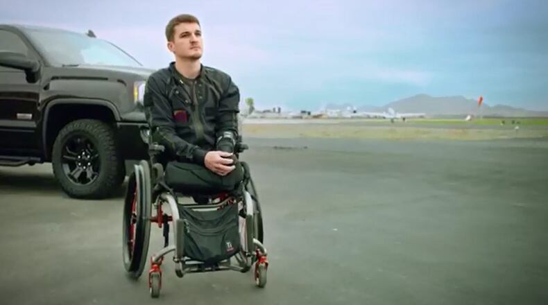 Cpl. Todd Love from Douglasville, GA skydives for wounded veterans as part of GMC's #EnlistMe campaign.