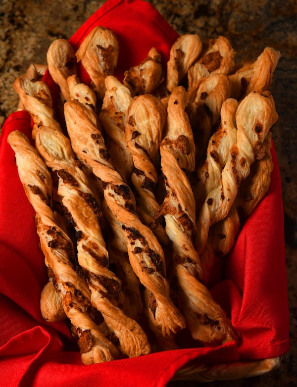 Akawi Twists (puff pastry with cheese) are often part of the Thanksgiving plan for sisters Farrah Haidar and Hala Yassine. (Styling by Farrah Haidar and Hala Yassine / Chris Hunt for the AJC)