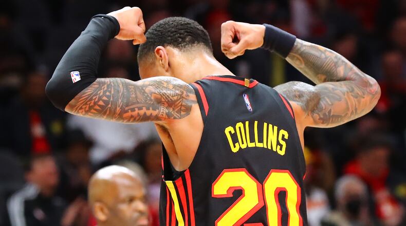 Hawks forward John Collins did “a little moving around” and some 4-on-4 on-court work Thursday. (Curtis Compton / Curtis.Compton@ajc.com)