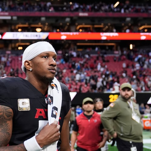 Atlanta Falcons quarterback Michael Penix Jr. (9) walks of the field after overtime of an NFL football game against the Carolina Panthers, Sunday, Nov. 16, 2025, in Atlanta. (AP Photo/Brynn Anderson)