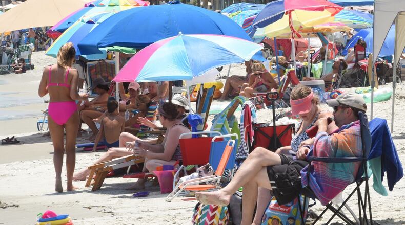 People enjoyed East Beach on St. Simons Island Tuesday, July 14, 2020. RYON HORNE / RHORNE@AJC.COM