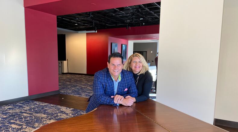 Anthony Rodriguez and Ann-Carol Pence inside the new Aurora Theatre facility.