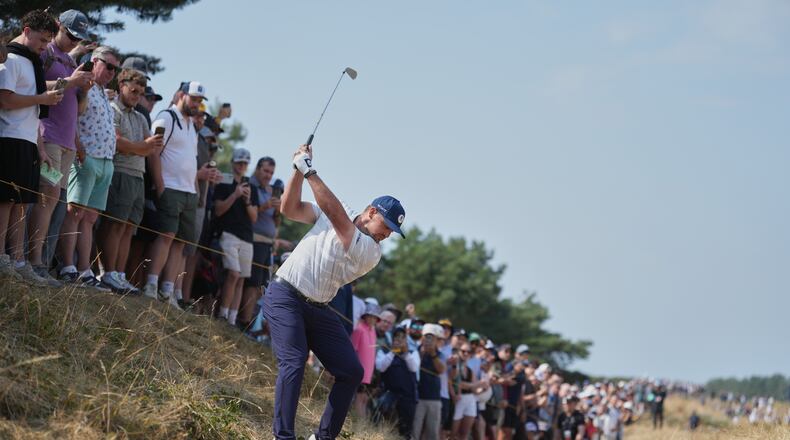 Bryson DeChambeau of the United States plays from the rough on the 1st hole during the third day of the British Open Golf championships at Royal Birkdale golf club, in Southport, England, Saturday, July 18, 2026. (AP Photo/Jon Super)