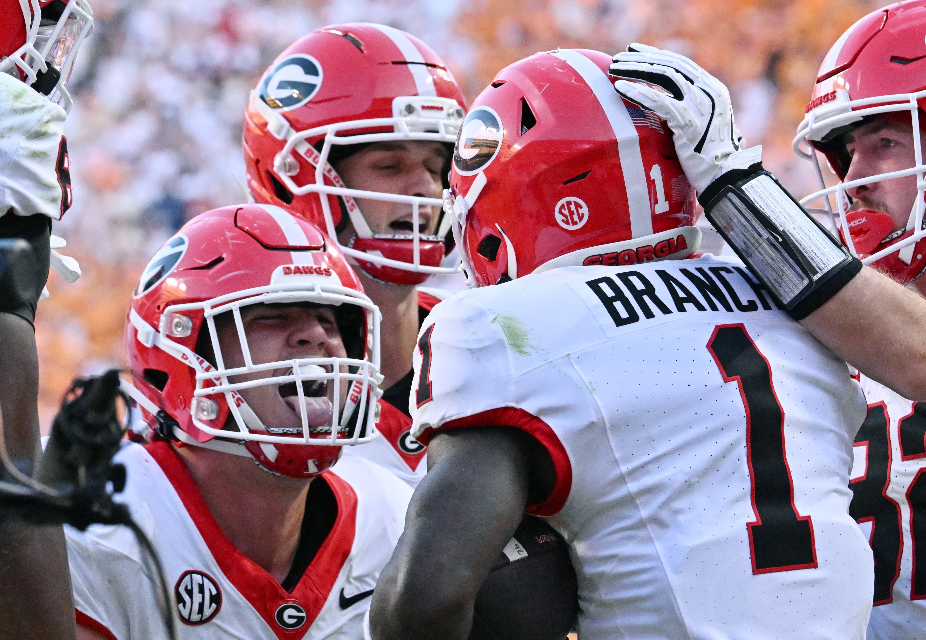 Georgia wide receiver Zachariah Branch (right center) celebrates after scoring a 2-point conversion against Tennessee near the end of fourth quarter at Neyland Stadium on Saturday, Sept. 13, 2025, in Knoxville, Tenn. Georgia won 44-41 in overtime. (Hyosub Shin/AJC)