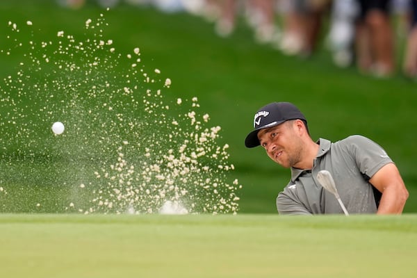 Xander Schauffele hits from the bunker on the sixth hole during the second round of the PGA Championship golf tournament at the Quail Hollow Club, Friday, May 16, 2025, in Charlotte, N.C. (AP Photo/David J. Phillip)