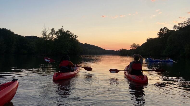 The Nantahala Outdoor Center provides guided kayaking and ducky tours on the Chattahoochee River at sunset. 
(Courtesy of the Nantahala Outdoor Center)
