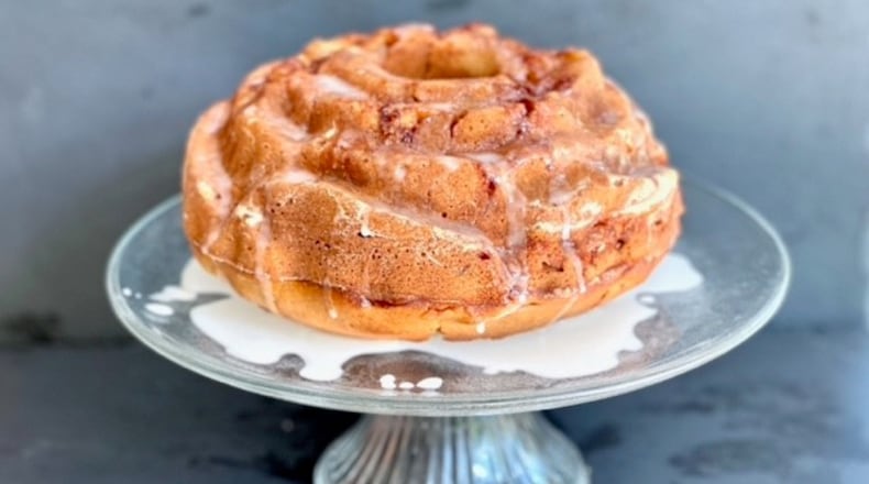 Rich, decadent apple cake gets its moisture and flavor from not-too-sweet apple cider. Kellie Hynes for The Atlanta Journal-Constitution