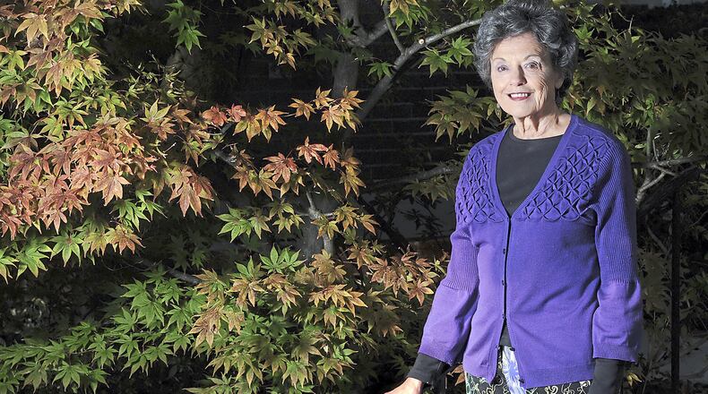 Ina Block poses for a portrait near a ‘Bloodgood’ Japanese maple Tuesday, Oct. 17, 2017, at her home in Mt. Lebanon. Mrs. Block has been gardening for more than 50 years and is the small garden winner of the PG’s Great Gardens Contest. (Nate Guidry/Pittsburgh Post-Gazette/TNS)