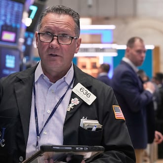 Trader Edward Curran works on the floor of the New York Stock Exchange, Monday, Nov. 24, 2025. (AP Photo/Richard Drew)