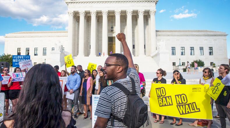 FILE — Protesters outside the Supreme Court after it announced that it would hear arguments on President Donald Trump’s revised travel ban, in Washington, June 26, 2017. (Al Drago/The New York Times)