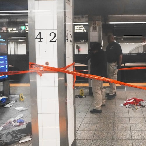 Police investigate the scene after a reported stabbing and shooting at the Grand Central subway station in New York on Saturday, April 11, 2026. (AP Photo/Ryan Murphy)