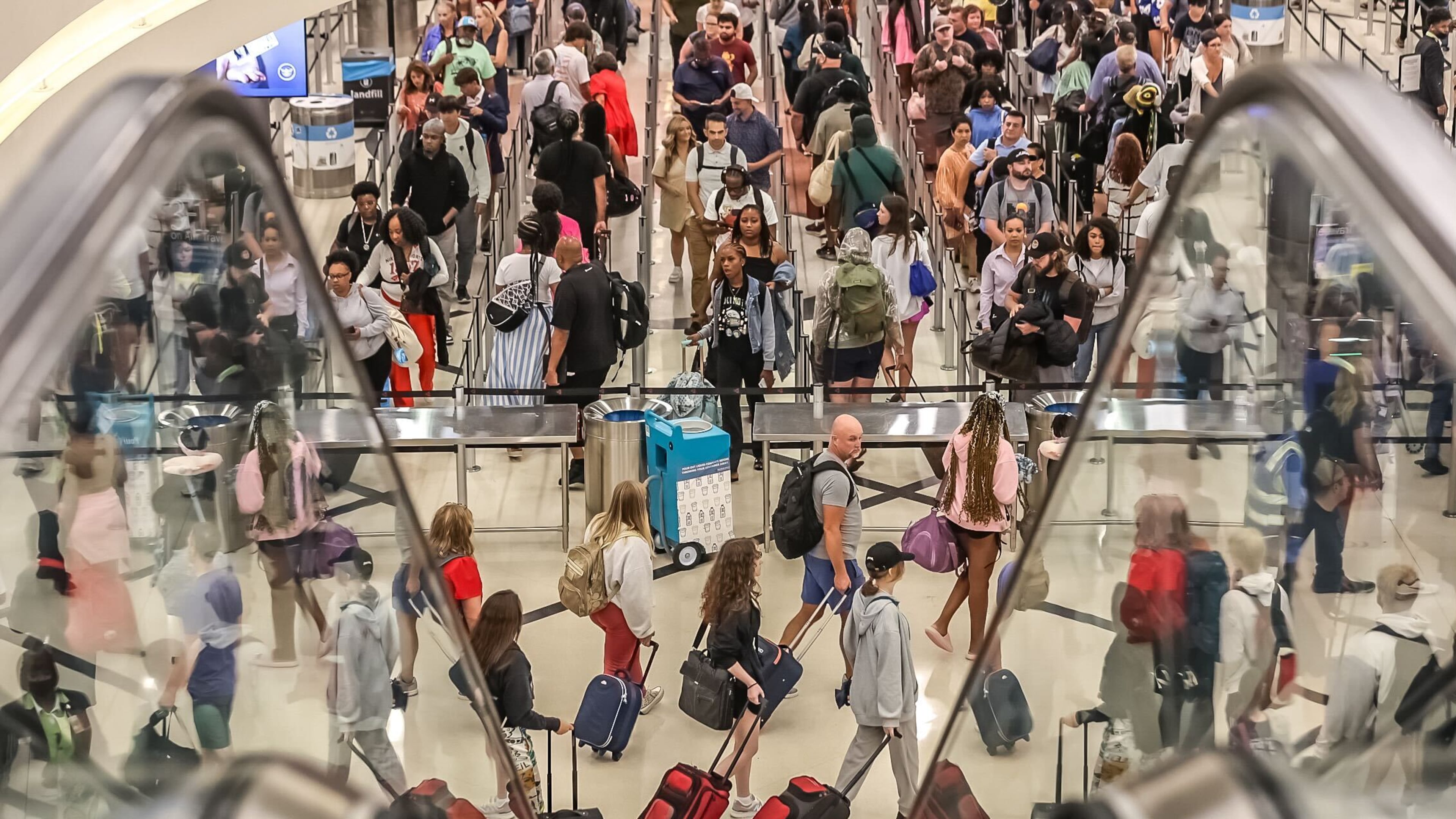 Crowds streamed into Hartsfield-Jackson International Airport on for the Fourth of July travel period in 2024. (John Spink/AJC file)