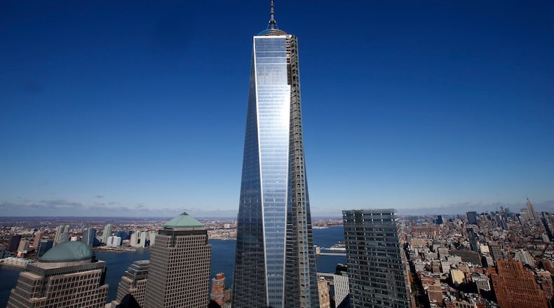 The One World Trade Center tower is seen in this picture taken from the 57th floor of the 4 World Trade Center tower in New York during a press tour, November 8, 2013.