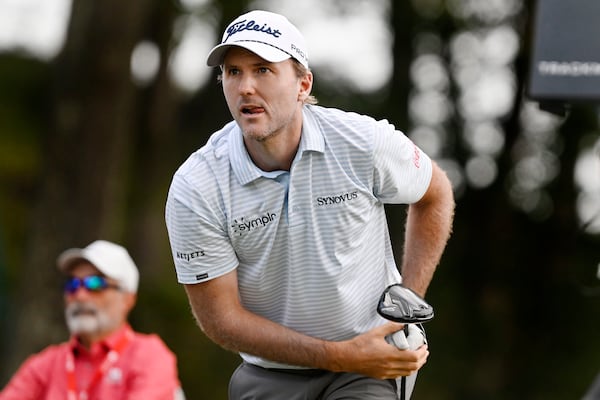 Russell Henley watches his tee shot on the 18th hole during the third round of the Travelers Championship golf tournament at TPC River Highlands, Saturday, June 21, 2025, in Cromwell, Conn. (AP Photo/Jessica Hill)
