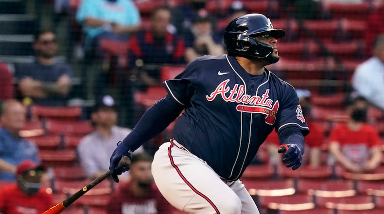 The Braves' Pablo Sandoval watches his single during the second inning of a game against the Boston Red Sox at Fenway Park, Tuesday, May 25, 2021, in Boston. (AP Photo/Charles Krupa)