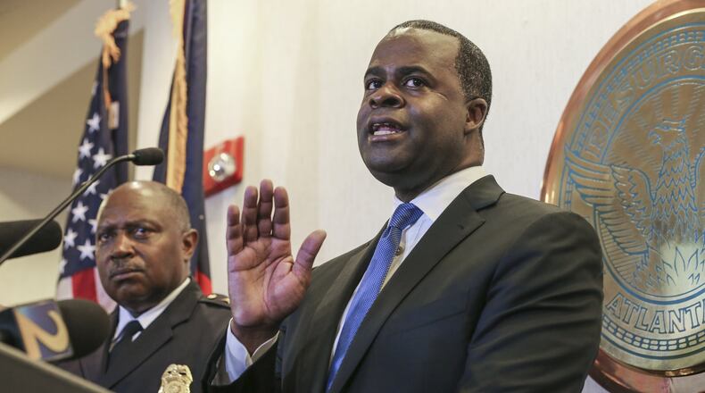 August 26, 2016 Atlanta: Right to left - Atlanta Mayor Kasim Reed and Police Chief George Turner. Reed on Monday pledged to support young immigrants who have been granted a temporary reprieve from deportation and vowed the city would forcefully prosecute hate crimes targeting newcomers. JOHN SPINK /JSPINK@AJC.COM
