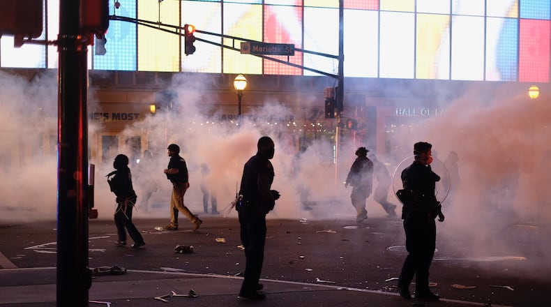 Protestors damaged the College Football Hall of Fame in Atlanta.     Ben Gray / Special