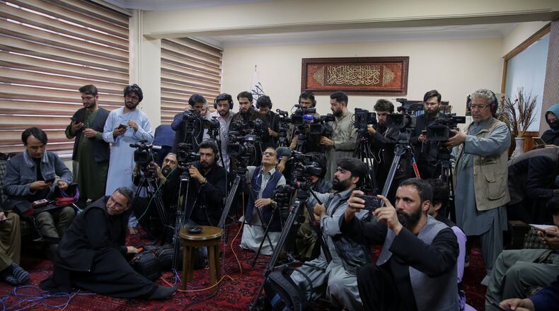 Local journalists gather for an online press conference with Afghan Defence Minister Mullah Muhammad Yaqoob after he signed a ceasefire agreement with his Pakistani counterpart Khawaja Asif in Qatar, at the Government Media Center in Kabul, Afghanistan, Sunday, Oct. 19, 2025.(AP Photo/Siddiqullah Alizai)